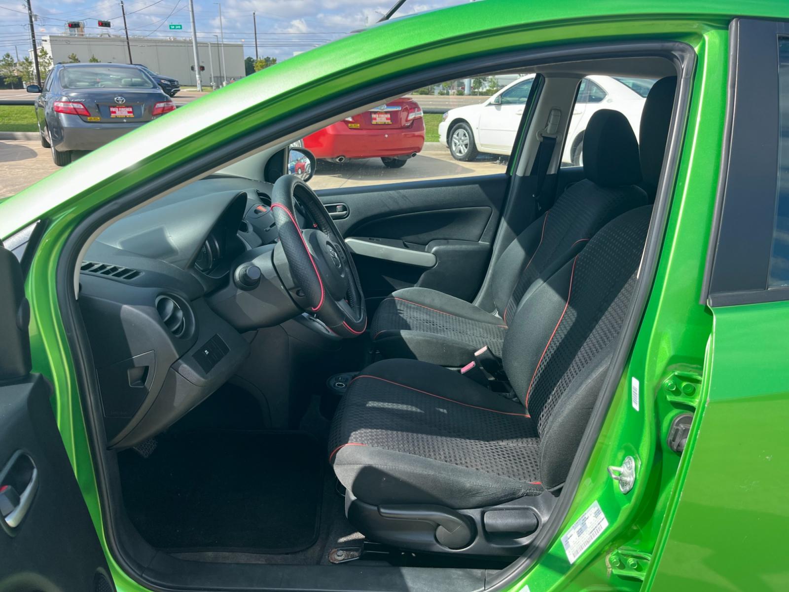 2013 green /black Mazda MAZDA2 Touring (JM1DE1LY1D0) with an 1.5L L4 DOHC 16V engine, Automatic transmission, located at 14700 Tomball Parkway 249, Houston, TX, 77086, (281) 444-2200, 29.928619, -95.504074 - Photo #8